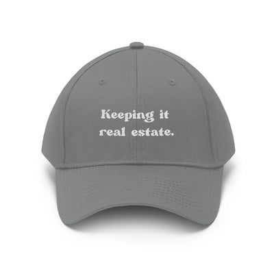 Hat - Keeping it Real (Estate)
